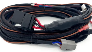 Lightforce LFDLHBEAST-U 12V universal BEAST driving light wiring harness with 40A relay, 3-mode rocker switch and HB3/H4 headlight adaptors.