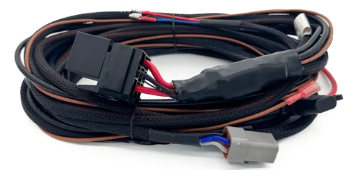 Lightforce LFDLHBEAST-U 12V universal BEAST driving light wiring harness with 40A relay, 3-mode rocker switch and HB3/H4 headlight adaptors.